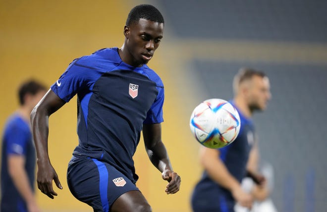 Tim Weah of the United States participates in a training session on the eve of the Group B match against England  at Al-Gharafa SC Stadium, in Doha, Qatar.