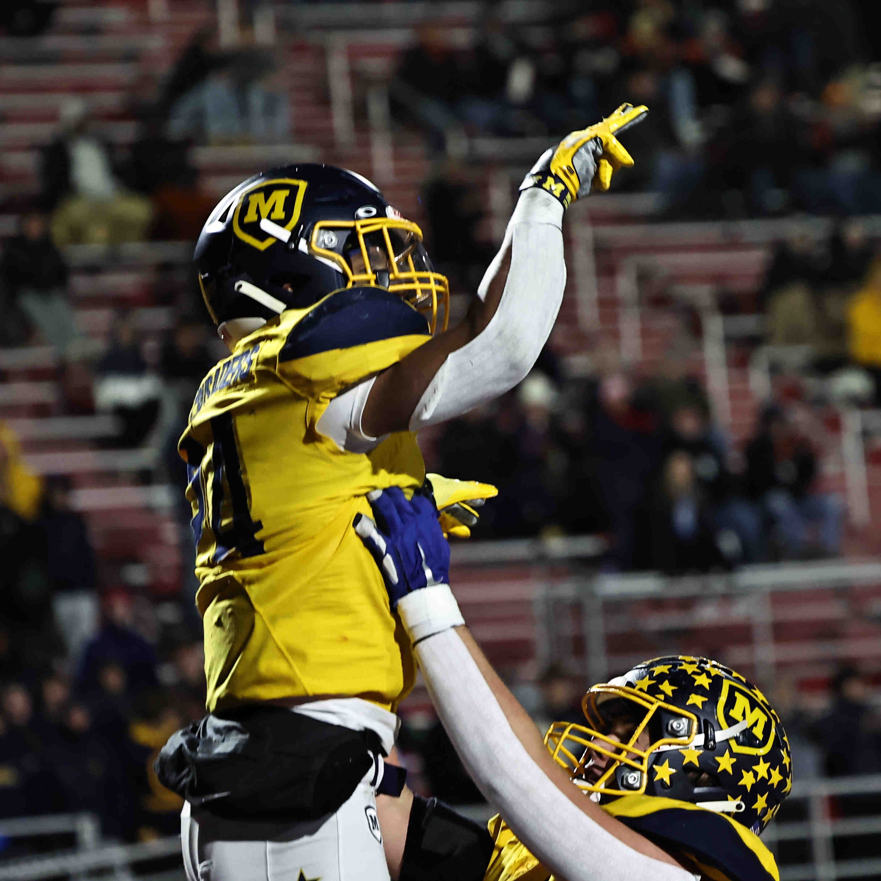 Moeller running back Jordan Marshall celebrates after he scores a touchdown during the Crusaders' state semifinal against Springfield Friday, Nov 25, 2022.
