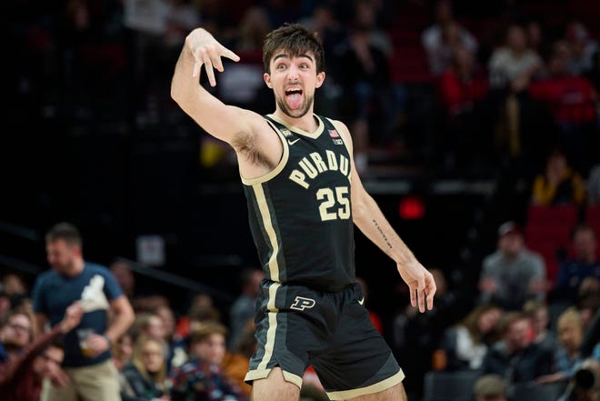 Nov 25, 2022; Portland, Oregon, USA;  Purdue Boilermakers guard Ethan Morton (25) celebrates after scoring a three point jump shot during the second half against the Gonzaga Bulldogs at Moda Center. Purdue won the game 84-66. Mandatory Credit: Troy Wayrynen-USA TODAY Sports