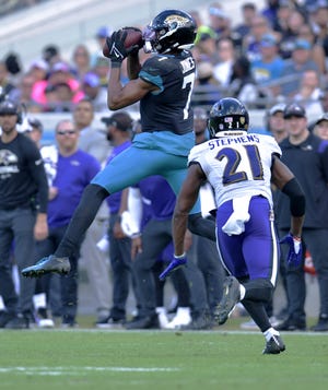 Jaguars wide receiver Zay Jones pulls down one of his career-high 11 receptions on Sunday in a 28-27 victory over Baltimore.