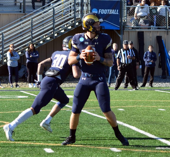 Shepherd quarterback Tyson Bagent, shown in a playoff game against Slippery Rock, threw for four touchdowns in a 48-13 national quarterfinal victory over Indiana (Pa.) and set the record for career passing TDs across all college levels with 158.