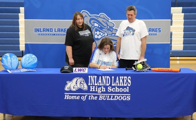 Inland Lakes senior Natalie Wandrie committed to play both volleyball and softball at Lindsey Wilson College (KY.) during a ceremony held at Inland Lakes High School on Saturday.