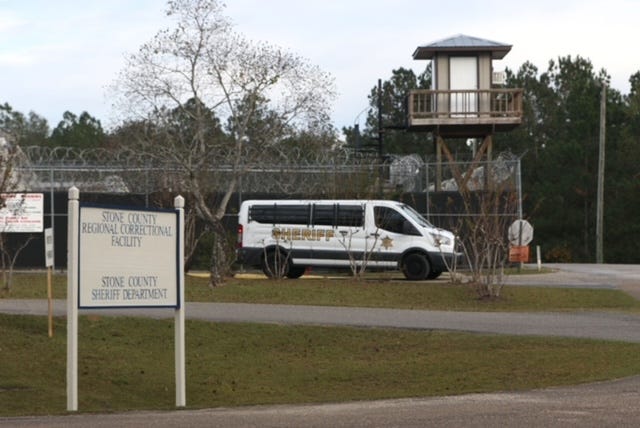 A prisoner transport van leaves the Stone County Regional Correctional Facility in Wiggins on Thursday, Nov. 17, 2022.