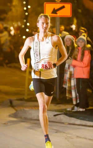Former Hartland running star Riley Hough won the Fantasy of Lights 5K in 15:24 Friday, Nov. 25, 2022 in Howell.