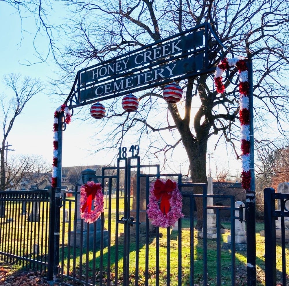 West Allis residents place Christmas decorations at historic cemetery