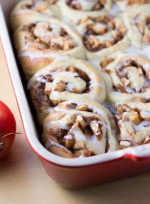 These soft and chewy cinnamon rolls and filled with sweet chopped apples flavored with cinnamon and nutmeg.