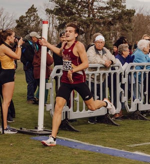 Former state champion Nathan Moore out of Lake High School will compete at his second straight NCAA Division II Cross Country Championships for Walsh University on Friday.