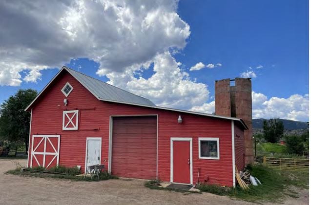 The small red barn and silo at 2917 S. Taft Hill Road may become a farm-to-table eatery on the 5-acre farm.