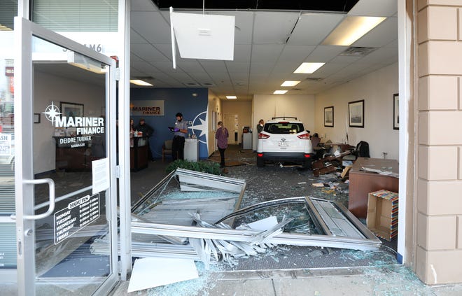 No one was injured after an elderly man drove his Ford Escape into Mariner Finance in the Northpointe Center in Zanesville on Tuesday.