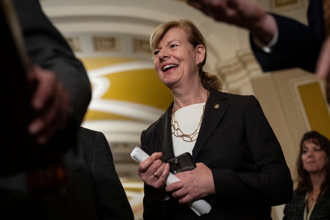 WASHINGTON, DC - Sen. Tammy Baldwin (D-WI) smiles during a news conference after a meeting with Senate Democrats at the U.S. Capitol Tuesday hours before the Senate passed the Respect for Marriage Act.