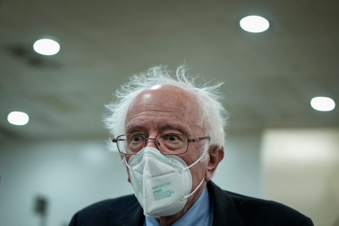 Sen. Bernie Sanders (I-VT) walks through the Senate subway after a procedural vote on the Respect For Marriage Act at the U.S. Capitol on Nov. 28 in Washington, DC.