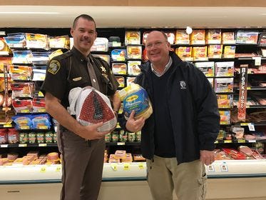 Pictured are Chippewa County Sheriff Mike Bitnar and Chippewa County Commissioner Scott Shackleton.