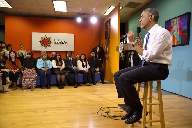 President Barack Obama delivers remarks on immigration and participates in a Q&A at the Casa Azafrán Community Center in Nashville, Tenn., December 9, 2014. (Official White House photo by Pete Souza) (This photo provided by THE WHITE HOUSE as a permission and may only be printed by the subject(s) in the photo for personal use. )