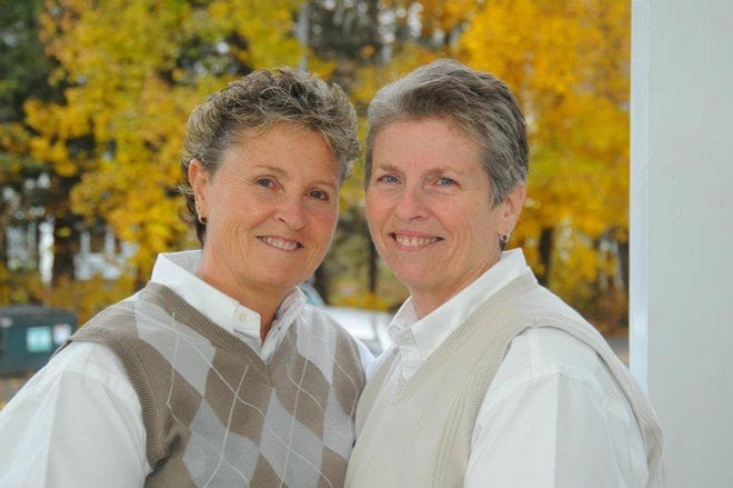 Sally Masters, right, and Chris Zingler at their wedding in 2011.
