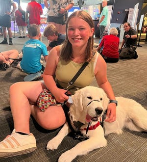 Harper meets Karla at the Patriots Hall of Fame. Karla was visiting from Denmark with her parents.