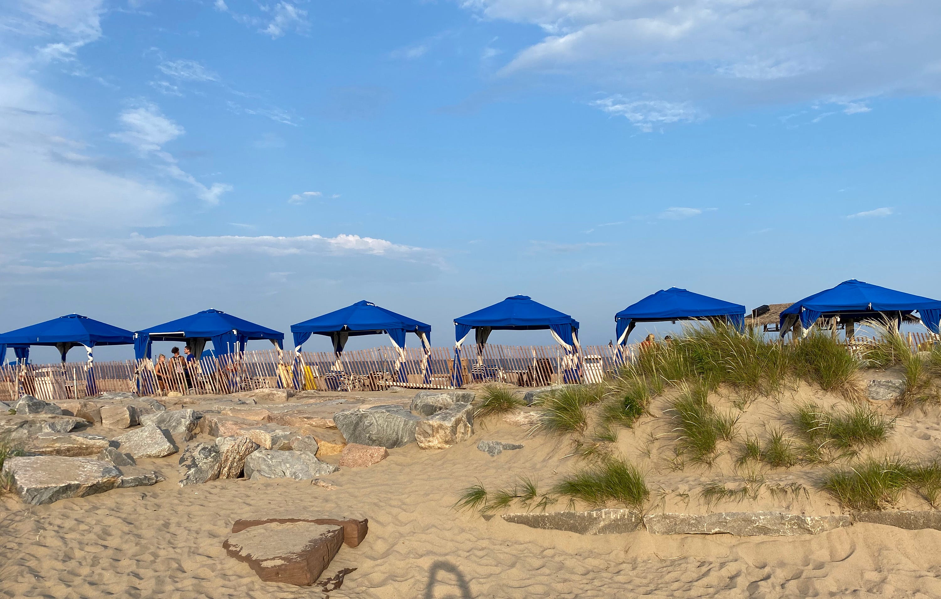 Aug. 26, 2022 -  Block Island, RI - Umbrellas line the beach at Ballard's Beach Resort on Block Island.