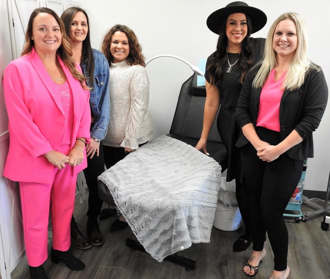 Tarah Jaras, owner of B. Radiant Wellness, with employees Lacey McCombs, Jackie Alexander, Hayley Miller and Tammie Hannah. the spa has outlets in Coshocton and Newcomerstown. Offered are medical weight loss, facial esthetics like Botox and dermal fillers, I.V. hydration and injectables, along with other self-care choices such as teeth whitening and facials.
