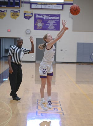 Bloom Carroll junior, Emily Bratton, sinks a three-pointer Wednesday night at Tom Petty Gymnasium. Bratton led the Bulldogs in scoring with 29 points and her team prevailed 61-38.