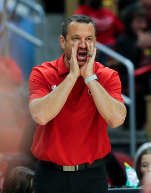 U of L head coach Jeff Walz instructed his team against Ohio State during their game at the Yum Center in Louisville, Ky. on Nov. 30, 2022.  