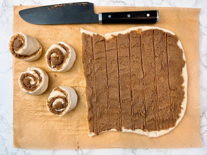 Pro tip: cut your cinnamon roll dough before rolling so you don't lose the sweet filling.