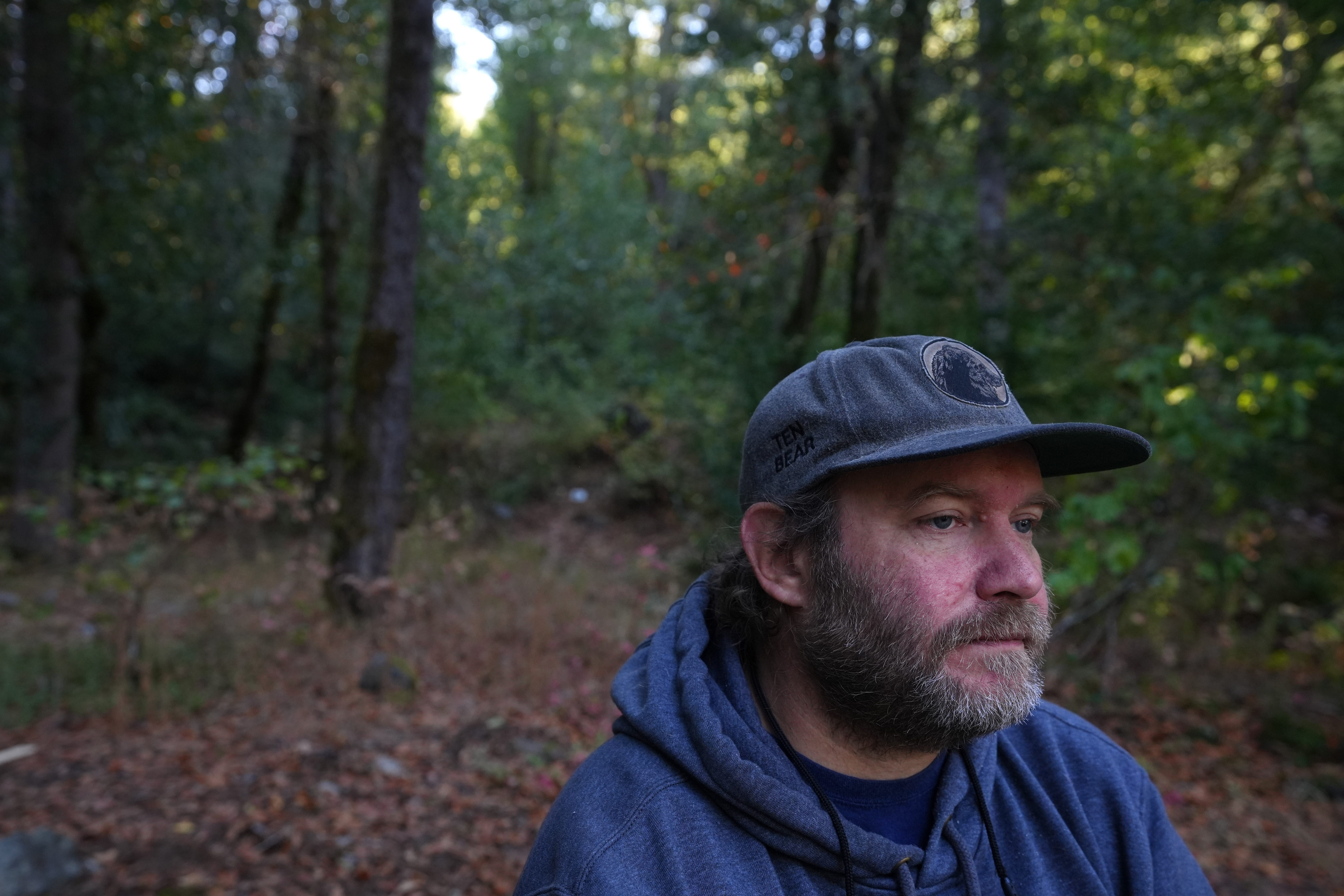 Bill Tripp director of natural resources and environmental policy  for the Karuk Tribe sits outside in the Middle Klamath River Valley on Monday, Oct. 3, 2022. 