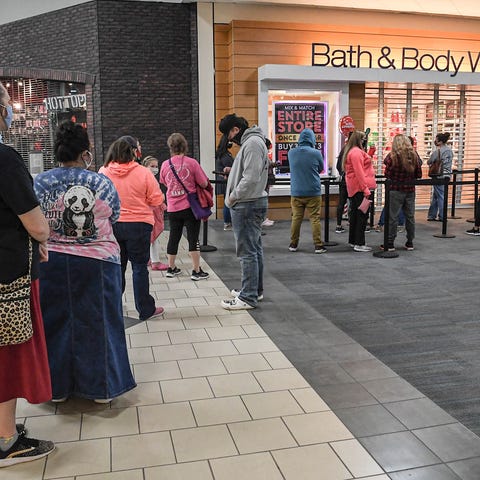 People line up for Bath & Body Works to open at 7 