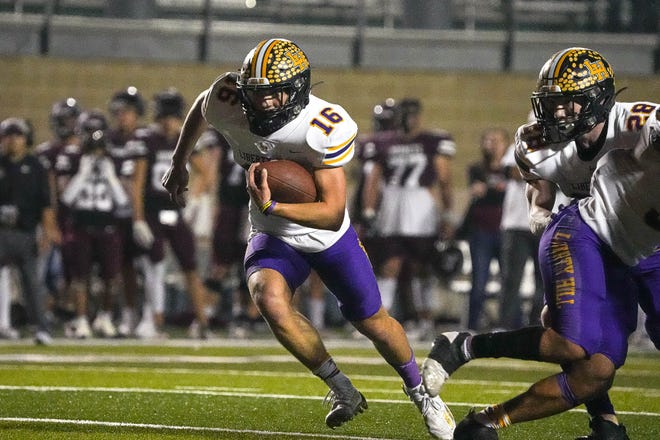 Liberty Hill quarterback Reese Vickers runs the ball against Corpus Christi Flour Bluff during the Class 5A Division II Region IV championship game Friday at Farris Stadium in San Antonio. Liberty Hill pulled away for a 63-43 win.