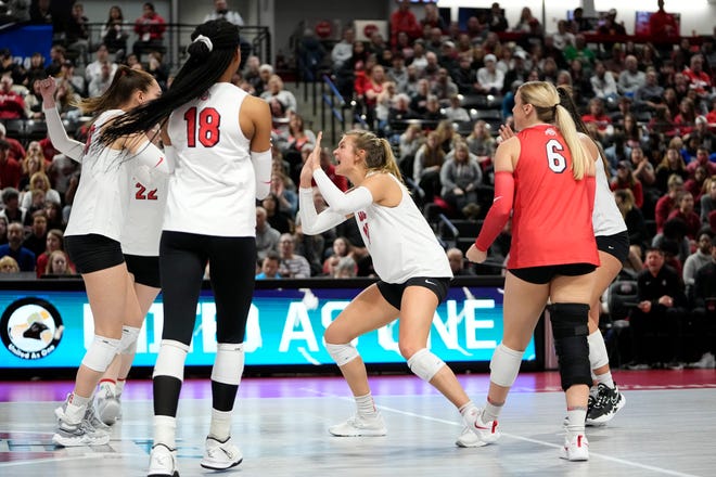 Dec 2, 2022; Columbus, Ohio, USA;  The Ohio State Buckeyes celebrate a point during the NCAA women's volleyball tournament first round match against the Tennessee State Tigers at the Covelli Center. Mandatory Credit: Adam Cairns-The Columbus Dispatch