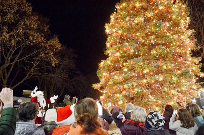 Santa leads the countdown as the community Christmas tree in Pennsylvania Park is lit on Friday, Dec. 2, 2022 at the annual Holiday Open House in downtown Petoskey.