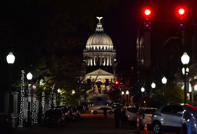 The State Capitol is seen during Visit Jackson's 2nd annual 'Capital City Lights' event in downtown Jackson, Miss., Friday, December 2, 2022.