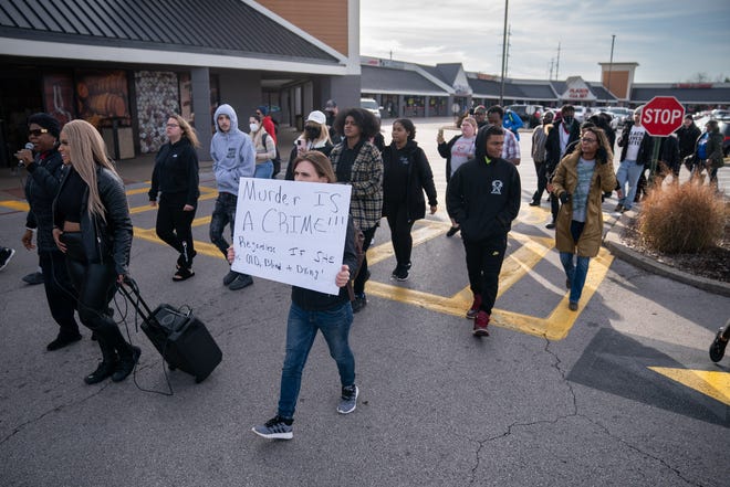 People march during a demonstration seeking justice for the murder of Emmett Till near the home of Carolyn Bryant Donham in Bowling Green, Ky., Saturday, Dec. 3, 2022. Donham is the woman whose accusations led to the murder of Till.