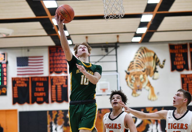Blackhawk's Tyler Heckathorn goes in for a layup during Saturday night's game at Beaver Falls Middle School.