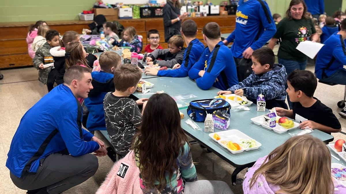Jefferson boys basketball team visits Sodt Elementary