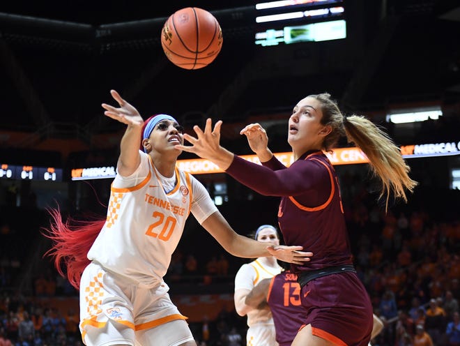 Tennessee center Tamari Key (20) and Virginia Tech center Elizabeth Kitley (33) after the ball during the NCAA college basketball game between the Tennessee Lady Vols and Virginia Tech Hokies in Knoxville, Tennessee on Sunday December 4, 2022. 
