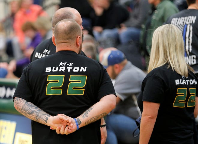 Northeastern head coach Cody Dudley wears a shirt honoring former Knight and fallen Richmond police officer Seara Burton for a game against Centerville Dec. 2, 2022.
