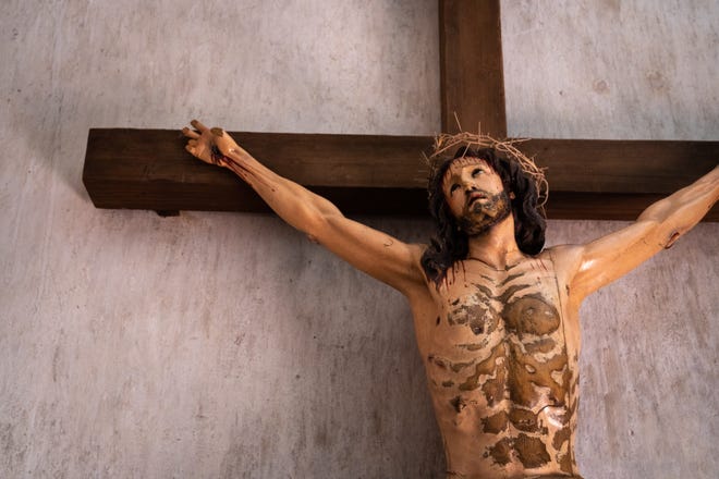 A crucifix in the San Xavier del Bac Mission in Tucson Nov. 22, 2022.