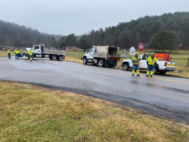 VDOT workers close the road near the site of a fatal multi-car crash on Tuesday morning, Dec. 6, 2022.