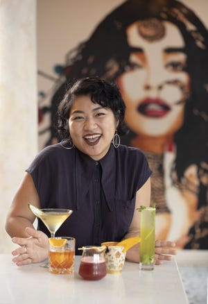 Genevieve Johnson, bar manager at Rooh, aims to craft cocktails that boast colorful, dynamic presentations. The Short North restaurant offers self-described “progressive” Indian cuisine.