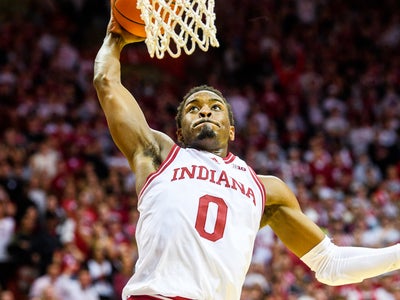 Back for unlikely sixth year, Xavier Johnson must glue IU basketball's new roster together