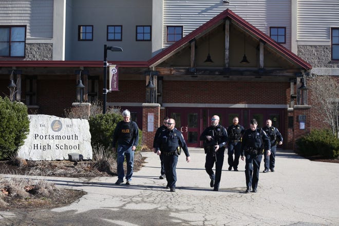 Portsmouth Police leave Portsmouth High School after responding to a report of an active shooter that was found to be a hoax Thursday, Dec. 8. Police gave the all clear at 11 a.m. and no intruders were found at any of the city's schools.