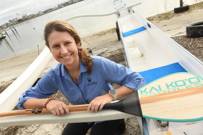 Kerri Allen, a UNCW and Hoggard High School graduate,  runs the N.C. Coastal Federation's Southeast Regional Office in Wrightsville Beach. She also is an avid outrigger canoe paddler. KEN BLEVINS/STARNEWS