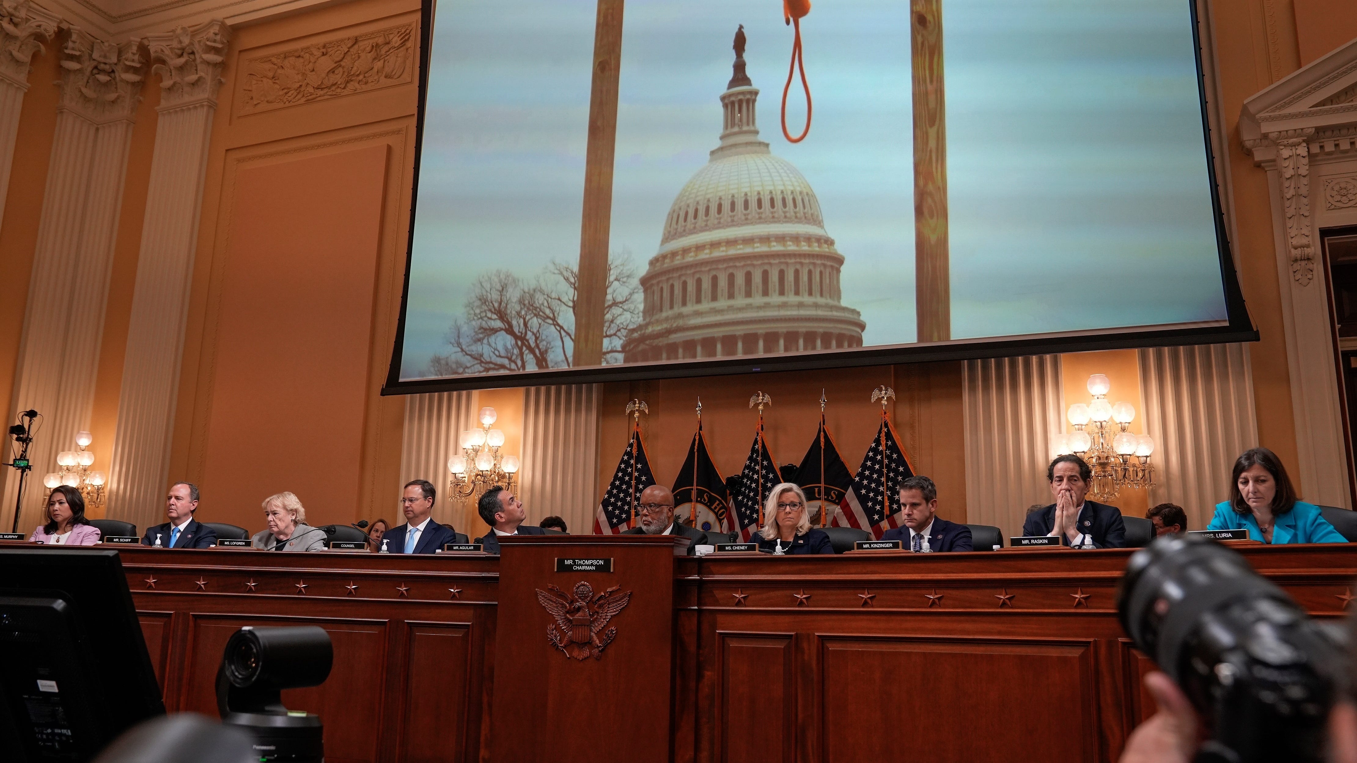 June 20, 2022:  A video plays showing an image from Jan. 6, 2021 of a gallows in front of the U.S. Capitol on a large screen during the opening moments of the House select committee to investigate the Jan.6th attack on the Capitol.