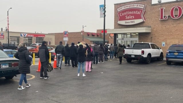 Shoppers line up waiting for Continental Sales to open to buy expired or nearly expired foods, among other items. With inflation still quite high, people are needing to find ways to stretch their dollars.