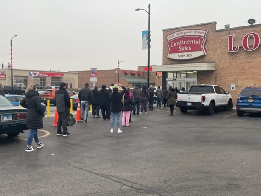 Shoppers line up, waiting for Continental Sales to open, to buy expired or nearly expired foods, among other things. With inflation near the highest level in 40 years, people increasingly need to find a way to stretch their dollars.