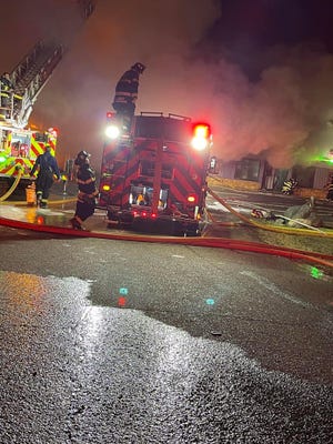 Fire crews throughout Portage County were fighting a fire at a Charlestown business Thursday night.