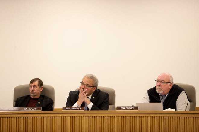 Sen. Brian Boquist, Sen. Lew Frederick and Sen. Lynn Findley listen during the Dec. 9 Joint Committee On Transportation at the Oregon State Capitol.