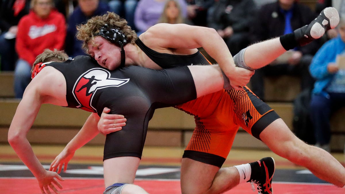 High school wrestling photos from Wisconsin Rapids Lincoln vs. Marshfield