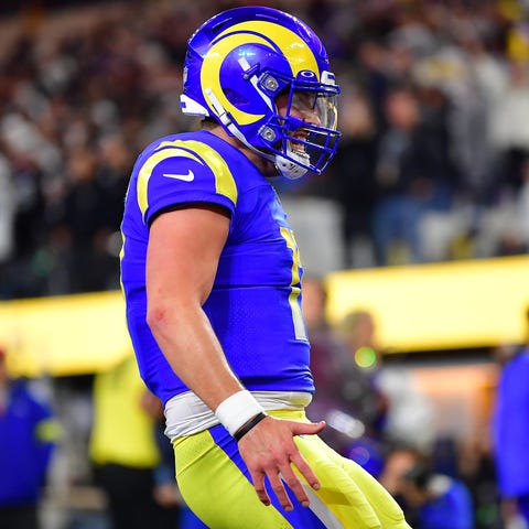 Los Angeles Rams quarterback Baker Mayfield celebr