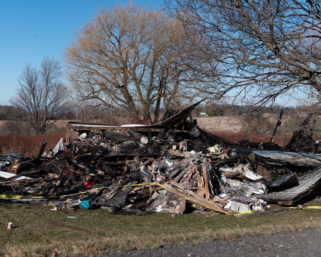 The remains of a fire on Shanley Road in Paris on Saturday, Dec. 10, 2022. At least 10 departments responded to a structure fire Friday night in Paris after high winds helped drive the blaze and left the single-family home a total loss, firefighters reported.