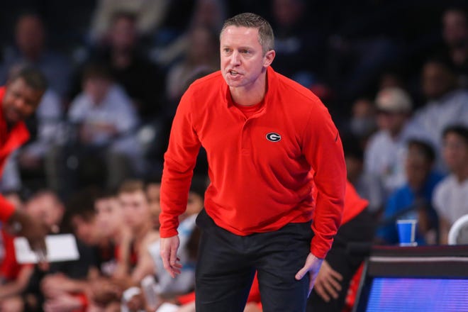 Georgia coach Mike White once wanted to play basketball at Notre Dame, where his father, Kevin, later hired Irish coach Mike Brey in the summer of 2000.